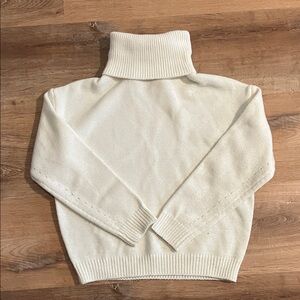 White knit turtleneck sweater